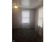 Bedroom showcasing patterned curtains, neutral walls and carpet, and a ceiling fan at 4521 Vernon Ave, Indianapolis, IN 46226