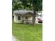 Charming, small one-story home with a covered porch and grassy front yard at 4521 Vernon Ave, Indianapolis, IN 46226