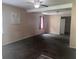 Spacious living room with neutral walls and a ceiling fan at 4521 Vernon Ave, Indianapolis, IN 46226