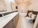 Modern bathroom featuring double sinks, a soaking tub, and stylish fixtures at 4635 Stansbury Ct, Indianapolis, IN 46254