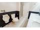 Modern bathroom featuring a dual-sink vanity, toilet, and shower with sleek fixtures at 4635 Stansbury Ct, Indianapolis, IN 46254