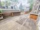 Outdoor deck with wood railings offering views of the community and surrounding trees at 4635 Stansbury Ct, Indianapolis, IN 46254