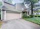 Charming home with a two-car garage, lovely landscaping, and mature trees at 4635 Stansbury Ct, Indianapolis, IN 46254