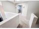 Hallway with carpeted floors, neutral paint, and lots of natural light at 4635 Stansbury Ct, Indianapolis, IN 46254