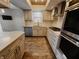 Bright eat in kitchen featuring stainless steel appliances at 4635 Stansbury Ct, Indianapolis, IN 46254