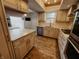 Open concept kitchen with granite counters and stainless steel appliances at 4635 Stansbury Ct, Indianapolis, IN 46254