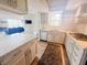 Modern kitchen featuring stainless steel appliances, granite countertops, and an eat-in island at 4635 Stansbury Ct, Indianapolis, IN 46254