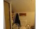 Cozy bathroom with a toilet, laundry basket and a wall decoration at 4747 Guion Rd, Indianapolis, IN 46254