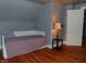 Bedroom with hardwood floors and natural light at 4747 Guion Rd, Indianapolis, IN 46254