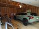 Unfinished garage with a new SUV parked at 4747 Guion Rd, Indianapolis, IN 46254