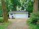 Detached two-car garage with ample storage space, providing convenience and functionality at 4747 Guion Rd, Indianapolis, IN 46254