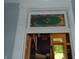 A colorful stained glass window above an interior doorway at 4747 Guion Rd, Indianapolis, IN 46254
