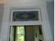 A colorful stained glass window above an interior doorway at 4747 Guion Rd, Indianapolis, IN 46254