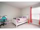 Bright bedroom with white furniture and decor, pink rug and curtains at 4832 W Safford Dr, New Palestine, IN 46163