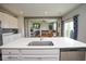 Open concept kitchen, dining, and living area with modern appliances and a spacious layout at 4832 W Safford Dr, New Palestine, IN 46163
