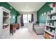 Bright home office with desk, comfortable seating, and stylish decor at 4832 W Safford Dr, New Palestine, IN 46163