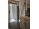 Bathroom featuring a modern vanity and barn door access to the shower at 496 Tague St, Greenfield, IN 46140