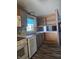 Kitchen featuring stone counters, stainless steel sink, and modern appliances at 496 Tague St, Greenfield, IN 46140