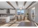 Dining area with wood beams, with an open floor plan to the kitchen at 4995 S 650 W, Jamestown, IN 46147