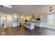Open-concept kitchen featuring stainless steel appliances and a large island with bar seating at 4995 S 650 W, Jamestown, IN 46147