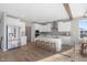 Modern kitchen featuring white cabinets, stainless steel appliances, and a large island at 4995 S 650 W, Jamestown, IN 46147