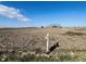 An open field with tilled soil under a blue sky with sparse clouds at 4995 S 650 W, Jamestown, IN 46147