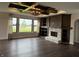 Stunning living room featuring a stone fireplace and large windows at 4995 S 650 W, Jamestown, IN 46147