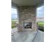 Outdoor fireplace featuring a brick surround and view of the surrounding area at 4995 S 650 W, Jamestown, IN 46147