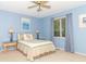 Charming bedroom with carpet, large window, and decorative lamps at 5104 W Prairiewood Dr, Muncie, IN 47304