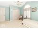 Relaxing bedroom with ceiling fan and a large closet at 5104 W Prairiewood Dr, Muncie, IN 47304