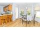Inviting dining area with table and chairs next to a door with access to a deck at 5104 W Prairiewood Dr, Muncie, IN 47304