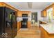 Modern kitchen boasting stainless steel appliances, light countertops, and wood cabinets at 5104 W Prairiewood Dr, Muncie, IN 47304