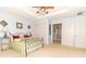 This bright main bedroom offers a closet and an ensuite with a shower at 5104 W Prairiewood Dr, Muncie, IN 47304