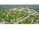 Aerial view of a neighborhood with single-Gathering homes, mature trees, and proximity to commercial and recreational areas at 5203 Carrollton Ave, Indianapolis, IN 46220