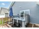 Backyard deck featuring a hot tub, perfect for relaxation and outdoor enjoyment on a sunny day at 5439 Maywood Dr, Whitestown, IN 46075