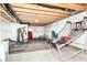 Unfinished basement offering an open canvas for customization, and workout equipment at 5439 Maywood Dr, Whitestown, IN 46075