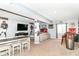 Finished basement features an entertainment area with a TV, bar, and comfortable seating at 5439 Maywood Dr, Whitestown, IN 46075