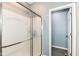 Modern bathroom featuring a glass door shower enclosure and updated fixtures at 5439 Maywood Dr, Whitestown, IN 46075