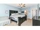 Spacious main bedroom with a ceiling fan, carpeted floor and furniture set at 5439 Maywood Dr, Whitestown, IN 46075