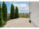A spacious paver patio is perfect for outdoor entertaining in this home's backyard at 565 Cembra Dr, Greenwood, IN 46143