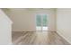 Open living area with view of backyard sliding door and stairs at 565 Cembra Dr, Greenwood, IN 46143