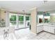 Bright bathroom offering a soaking tub, a shower, double vanity, and access to a private deck at 6220 E 56Th St, Indianapolis, IN 46226