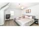 This spacious bedroom boasts neutral tones, modern art, and a comfortable king-size bed, creating a relaxing retreat at 6220 E 56Th St, Indianapolis, IN 46226