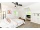 Bright bedroom with sloped ceiling, modern decor, and a cozy reading corner offering a comfortable retreat at 6220 E 56Th St, Indianapolis, IN 46226