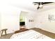 Serene bedroom featuring sloped ceilings, ample natural light, and a cozy atmosphere for relaxation and rest at 6220 E 56Th St, Indianapolis, IN 46226