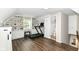 Bonus room with custom built ins, natural light, and exercise equipment at 6220 E 56Th St, Indianapolis, IN 46226