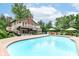 Large backyard pool with surrounding patio space, perfect for entertaining and outdoor relaxation at 6220 E 56Th St, Indianapolis, IN 46226