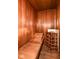 This property offers a stunning wood sauna with a wooden bench and heating equipment at 6220 E 56Th St, Indianapolis, IN 46226