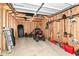 Organized shed interior showcases storage solutions for lawn equipment, tools, and various outdoor supplies at 6220 E 56Th St, Indianapolis, IN 46226