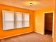 Bright bedroom with a window bringing in natural light and a closet that provides ample space at 624 N Rural St, Indianapolis, IN 46201